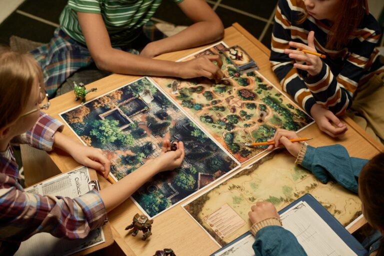 Kids gathered by table with board game